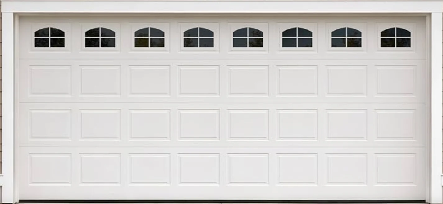 Garage door product reference beside a residential facade