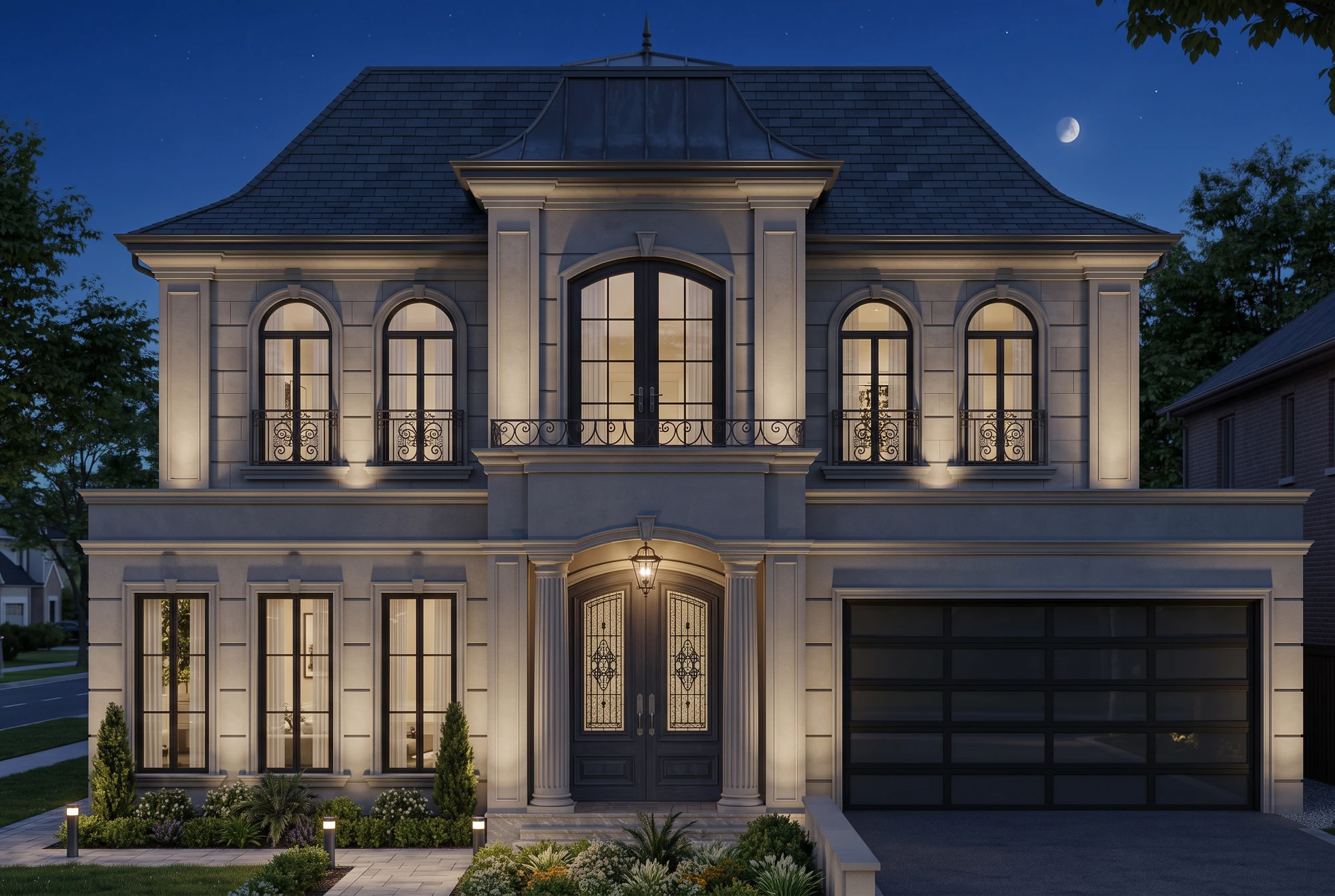 French Provincial home at night with illuminated facade and windows