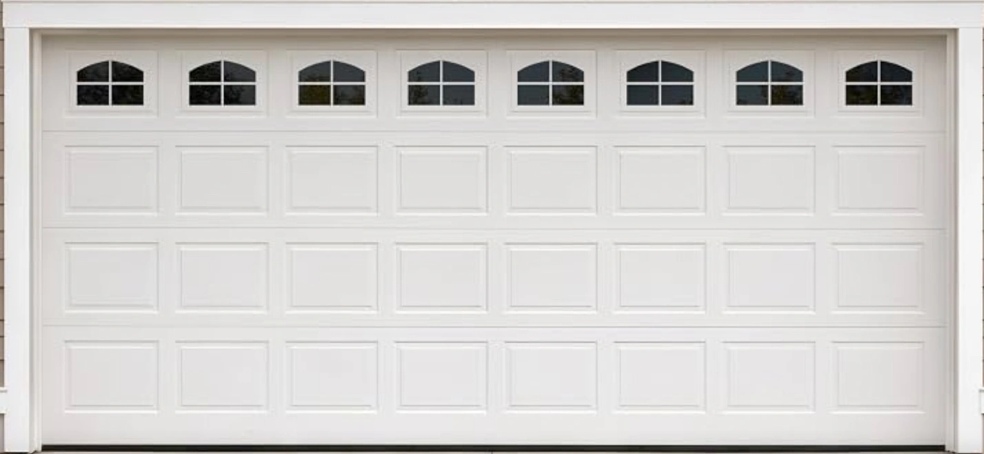 Reference photograph of a white panelled garage door